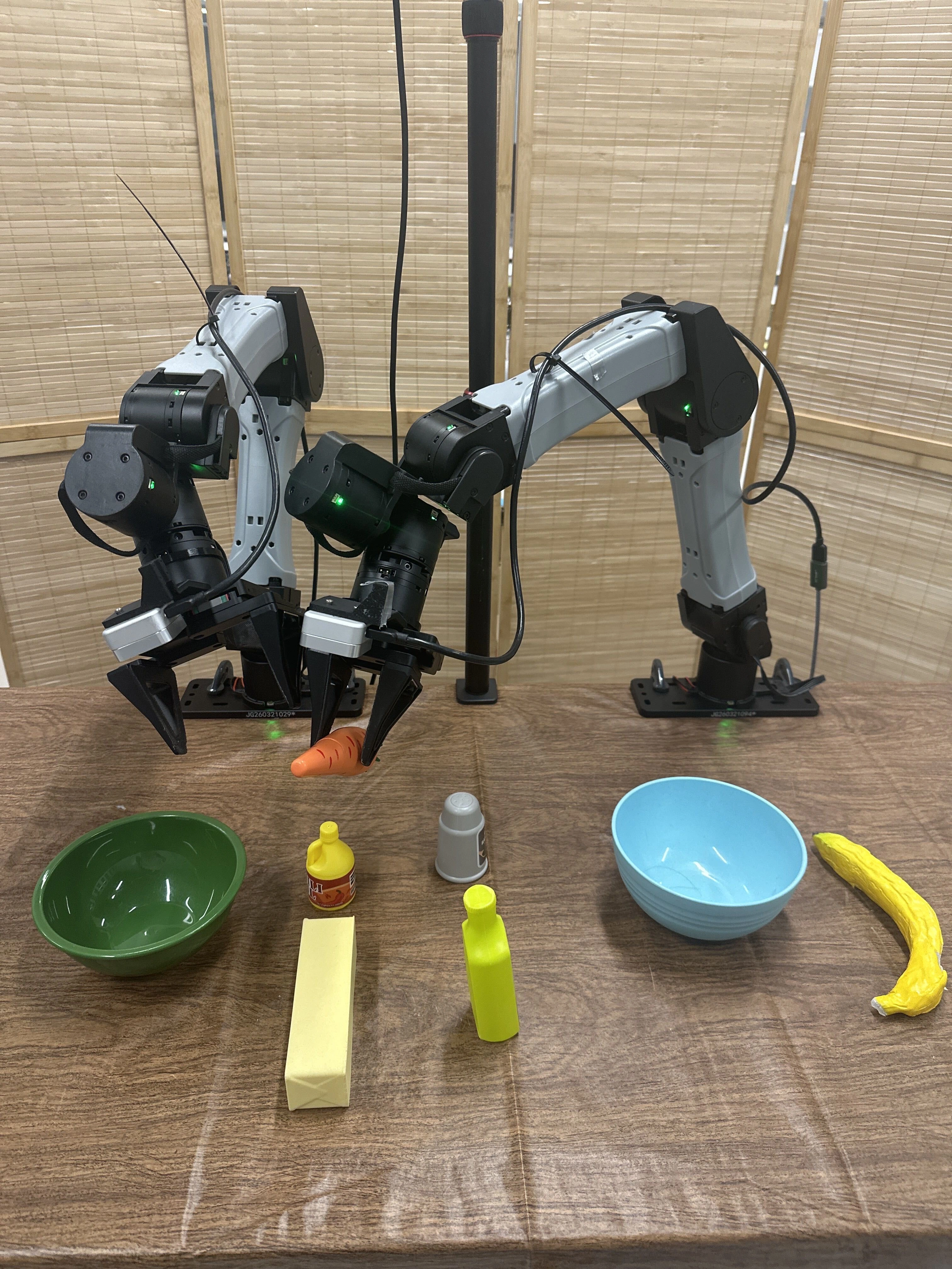 Original full-resolution photo of the bimanual YAM evaluation setup